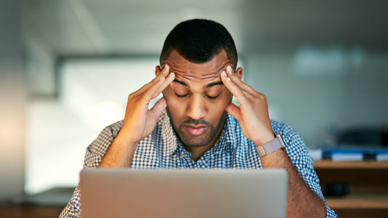 Stressed employee at work place